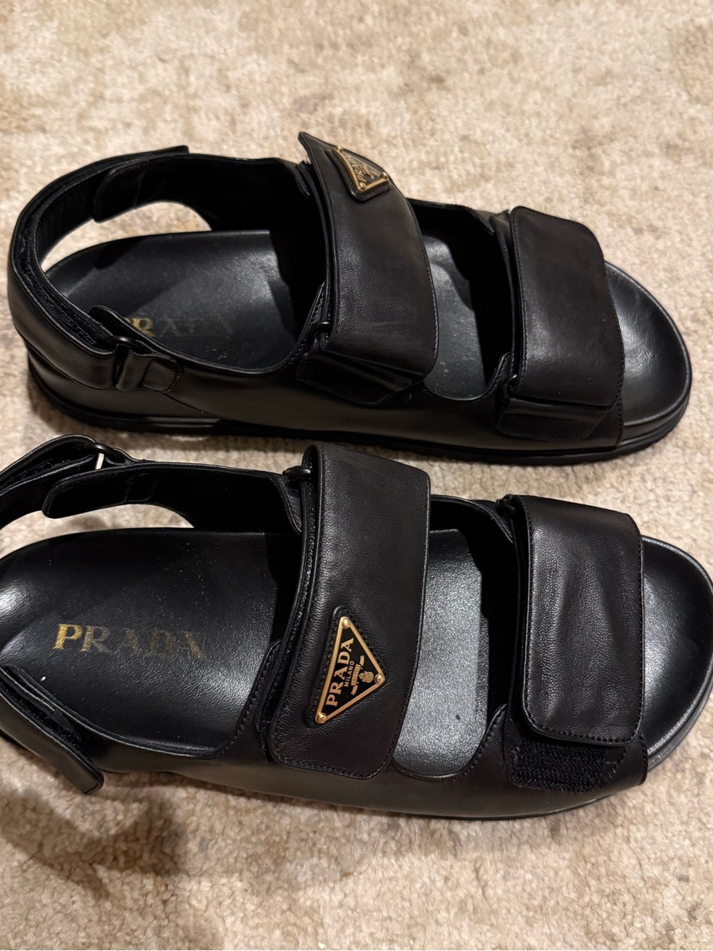 Prada Women’s Black Leather Dual-Strap Sandals with Gold Logo - Picture 2 of 8